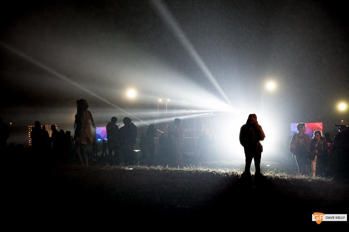 A lone figure silhouetted by the lights of the main stage at NOS Primavera Sound, Porto by David Kelly
